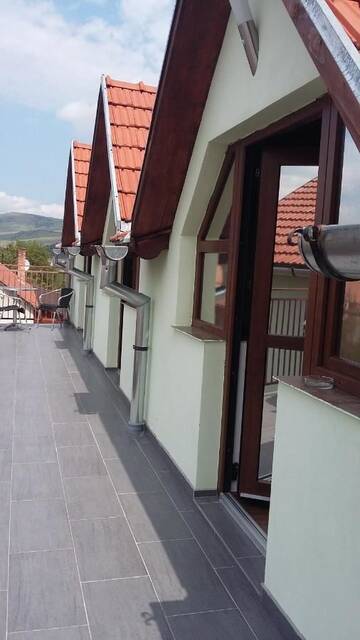 Фото номера Двухместный номер с 2 отдельными кроватями Гостевой дом Pensiunea Casa Szabi г. Luna de Sus 6