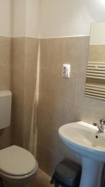Фото номера Двухместный номер с 2 отдельными кроватями Гостевой дом Pensiunea Casa Szabi г. Luna de Sus 3